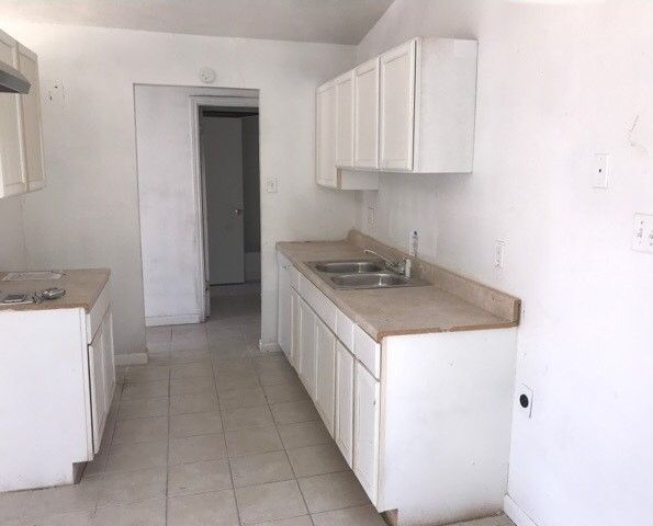 Rehabbed kitchen with new counters and cabinets